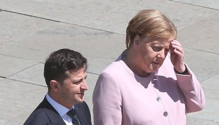 Merkel titrəməyə görə istefa verəcək?