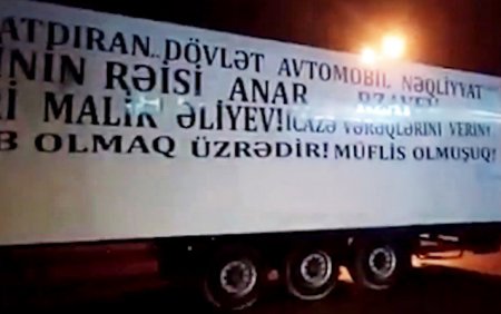 Etiraz etdikləri məmurların adını maşınlara yazdılar -  